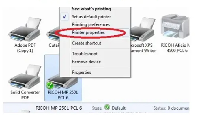 Chọn devices and printers sau đó chọn Printer properties